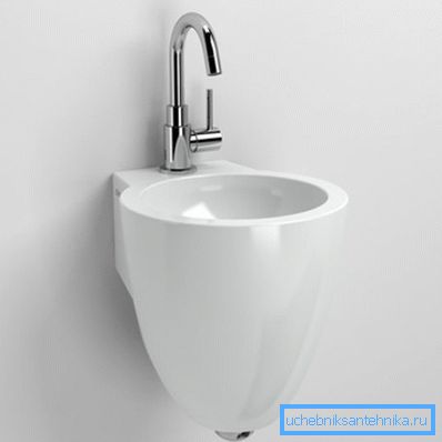 Auf dem Foto - die Schüssel hat einen Durchmesser von 270 mm, was wahrscheinlich das kleinste Waschbecken in der Toilette ist. Auf dem Foto - die Schüssel hat einen Durchmesser von 270 mm, was wahrscheinlich das kleinste Waschbecken in der Toilette ist.