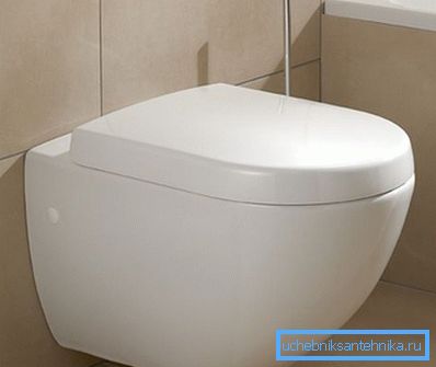 In der Wand ist der WC-Deckel in besonderer Weise angebracht. In der Wand ist der WC-Deckel in besonderer Weise angebracht.